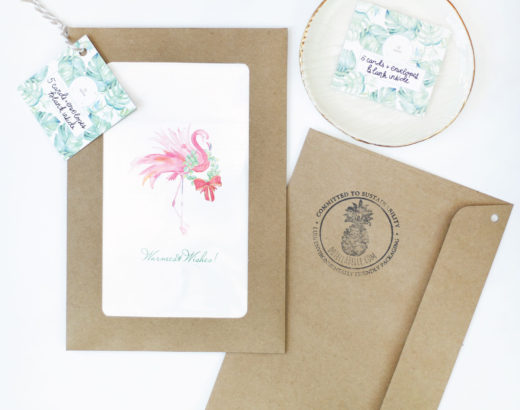 Watercolor Pink Flamingo Christmas Cards sustainably packaged in biodegradable bags.