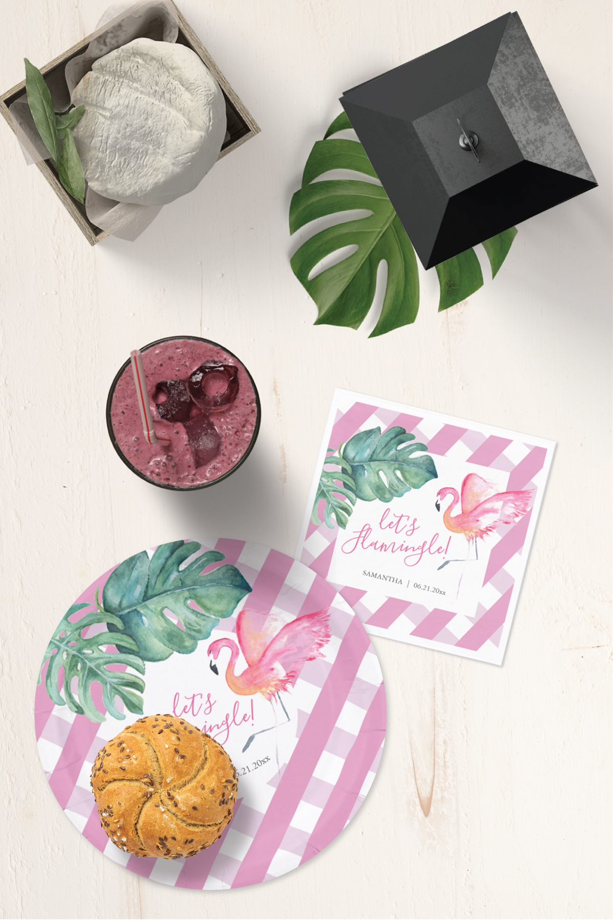 Tropical monstera leaves, pink flamingo and gingham backyard party theme