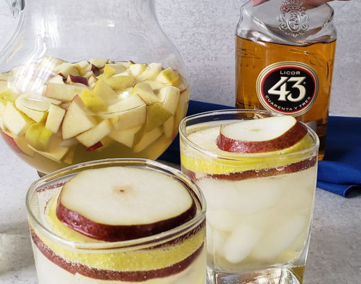 White wine sangria made with fall fruit, pinot grigio, 43 liquor