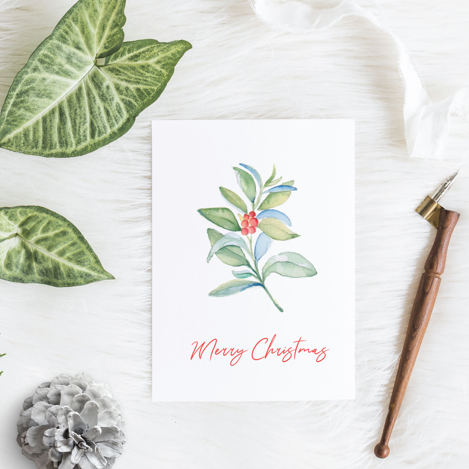 Botanical boxed Christmas Cards 2021 on sale watercolor red berries and leaves by Victoria Grigaliunas with the words Merry Christmas. Click to Shop Christmas Cards 2021