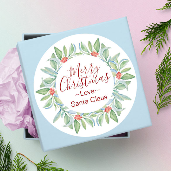 Personalized Christmas stickers features green foliage and red berries.