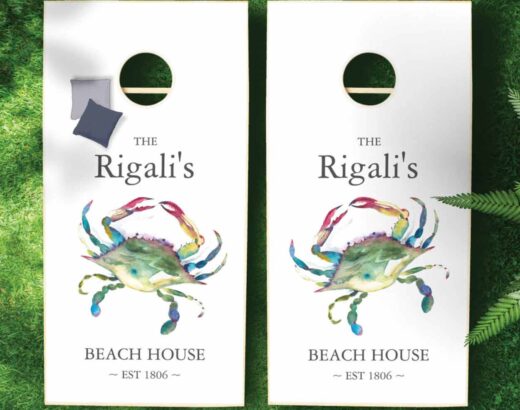 cornhole lawn game customize with your name and whatever you like. Features watercolor blue crab art by Victoria Grigaliunas