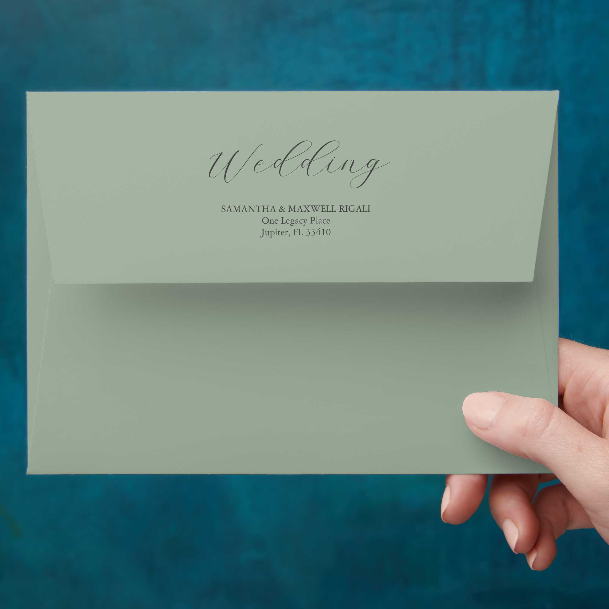 Return address envelope in sage green.