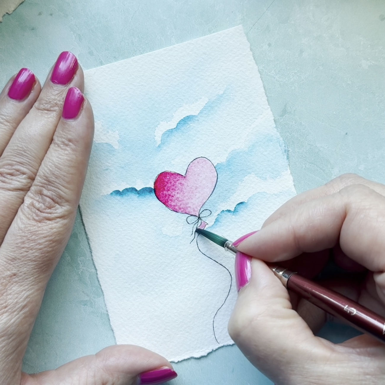 DIY Valentines Day card idea using watercolor paint.