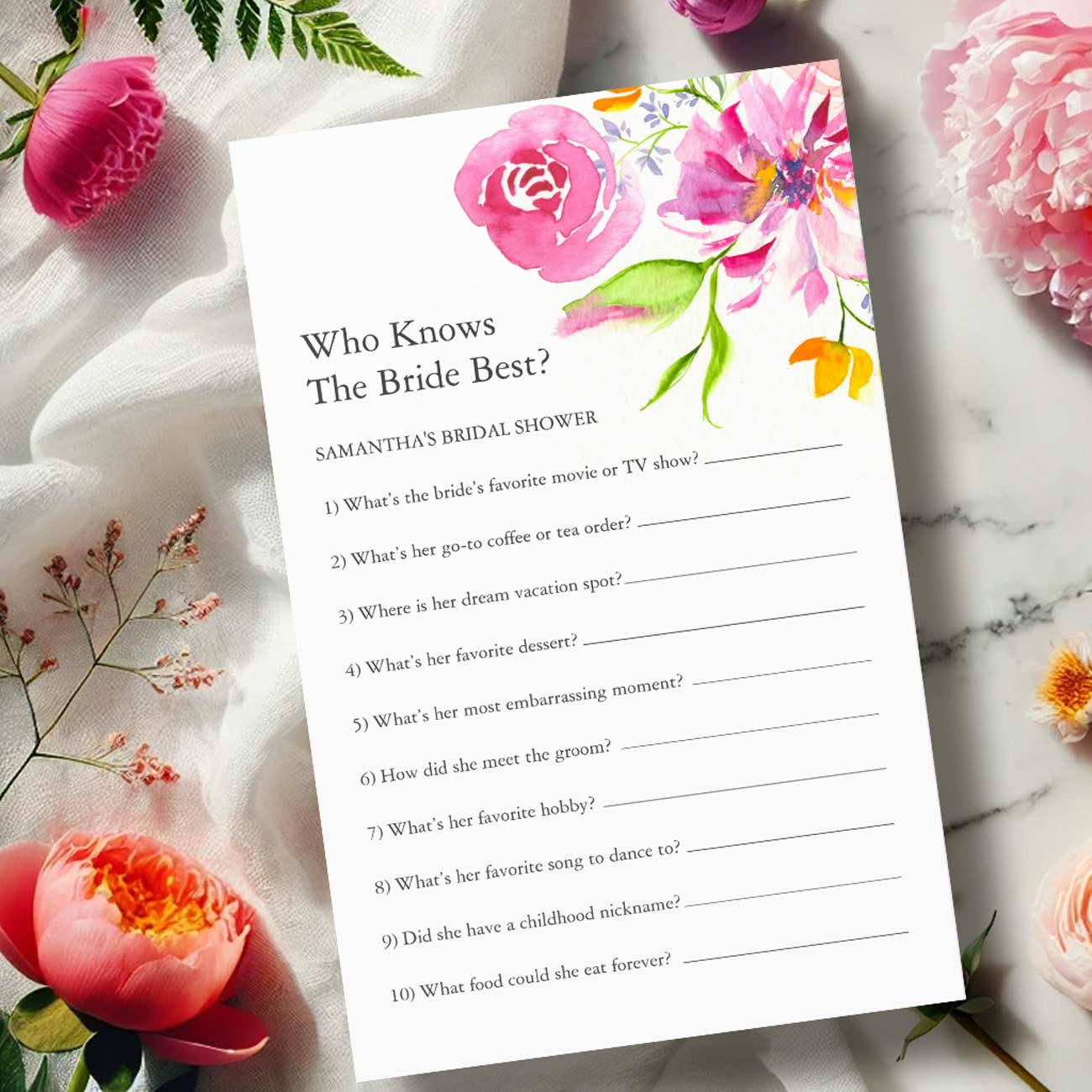 Love is in bloom bridal shower games who knows the bride best with watercolor pink floral art by Victoria Grigaliunas of Do Tell A Belle